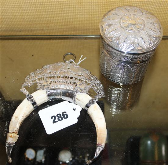 Indian silver cigarette box and cover and a Malayan silver and lions claw ornament (2)